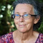 a woman wearing glasses
