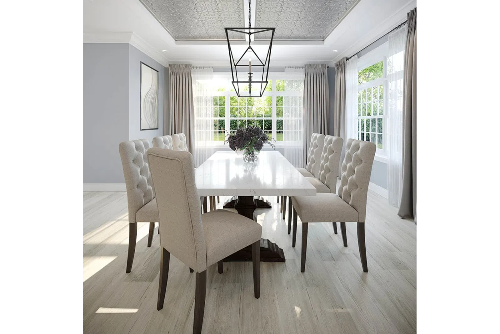 Bright dining room with a white marble table, beige tufted chairs, large windows, and modern pendant light.