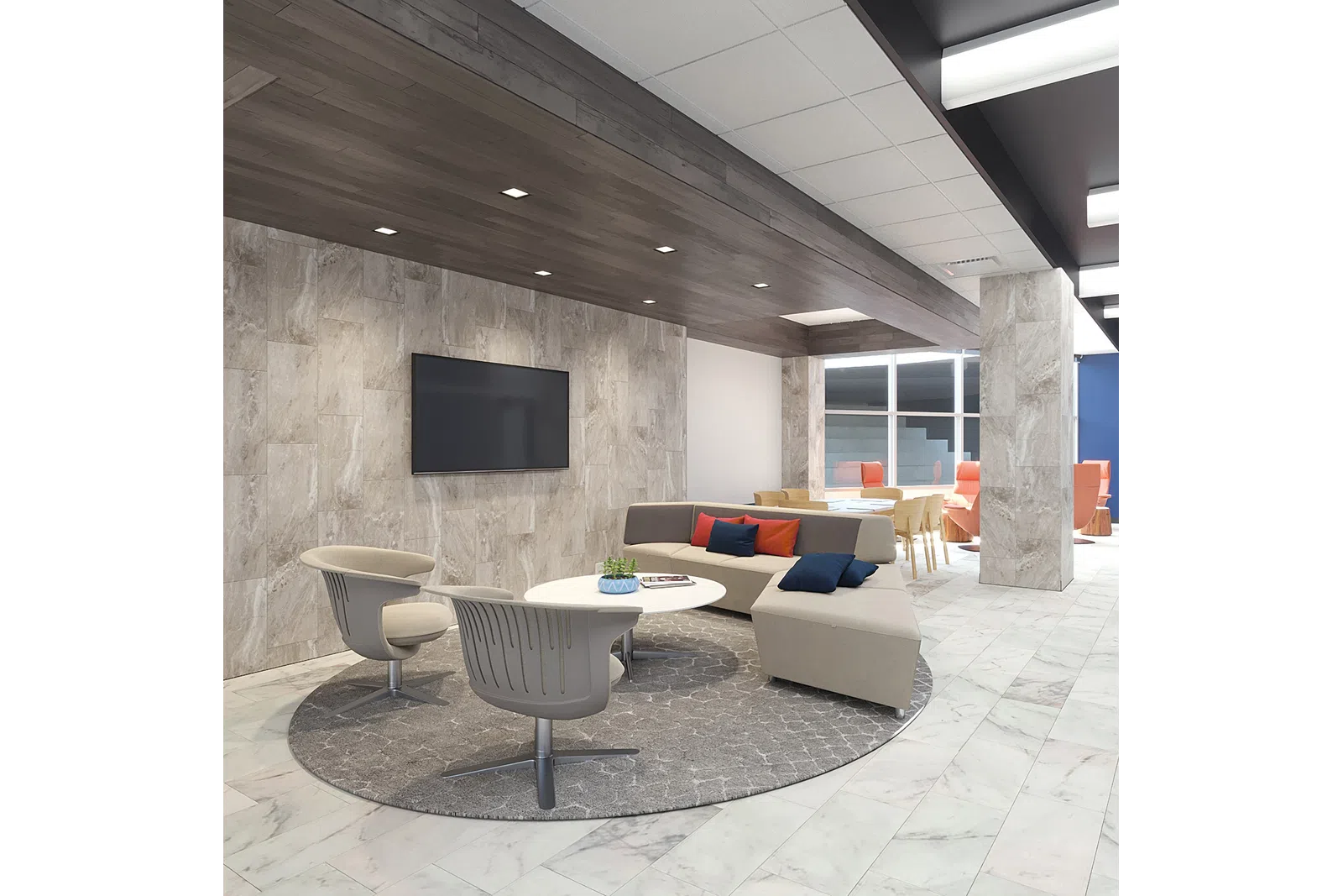 Modern office lounge with beige sectional sofa, gray chairs, round table, and wall-mounted TV on tiled wall.