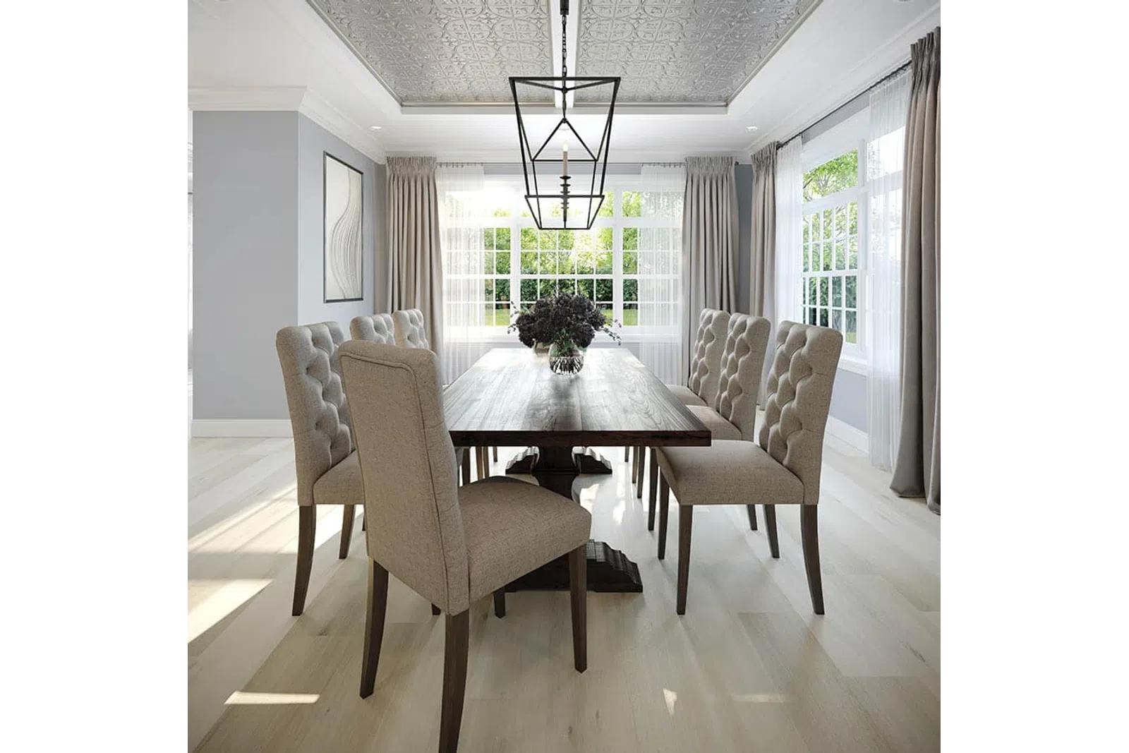 Modern dining room with tufted beige chairs, dark wood table, large windows, and decorative ceiling light fixture