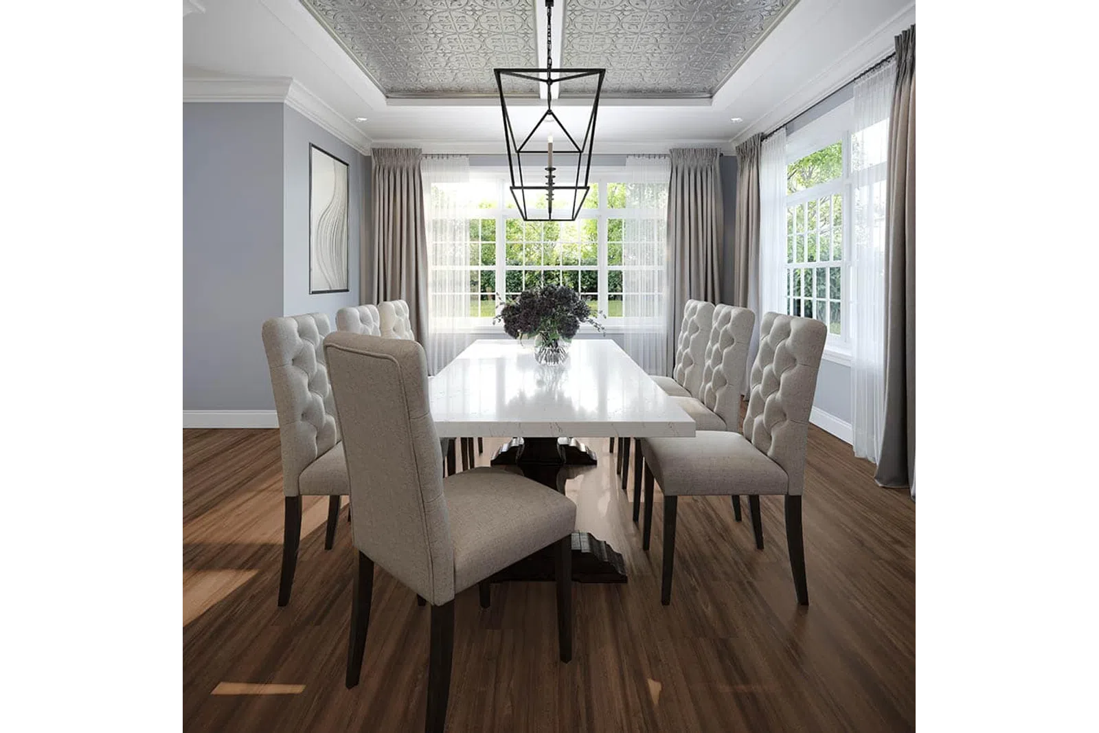 Bright dining room with white table, tufted beige chairs, wood floor, large windows, and decorative ceiling light fixture