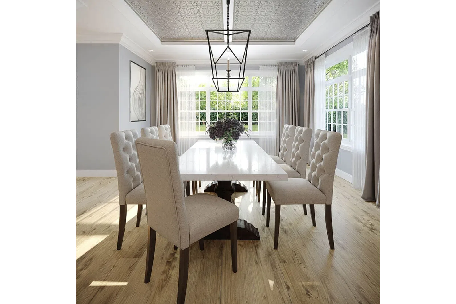 Bright dining room with large windows, beige tufted chairs, a white table, wooden floor, and decorative pendant light.