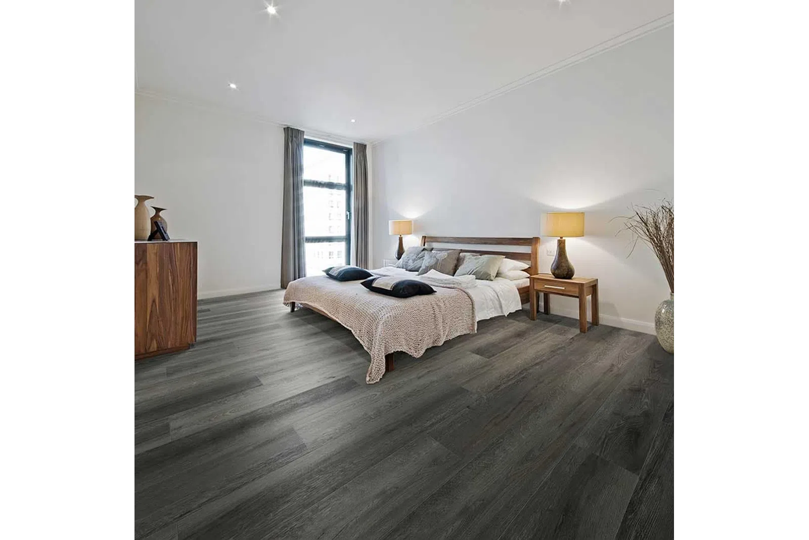 Modern bedroom with dark wood flooring, neutral bedding, wooden furniture, floor-to-ceiling window, and bedside lamps