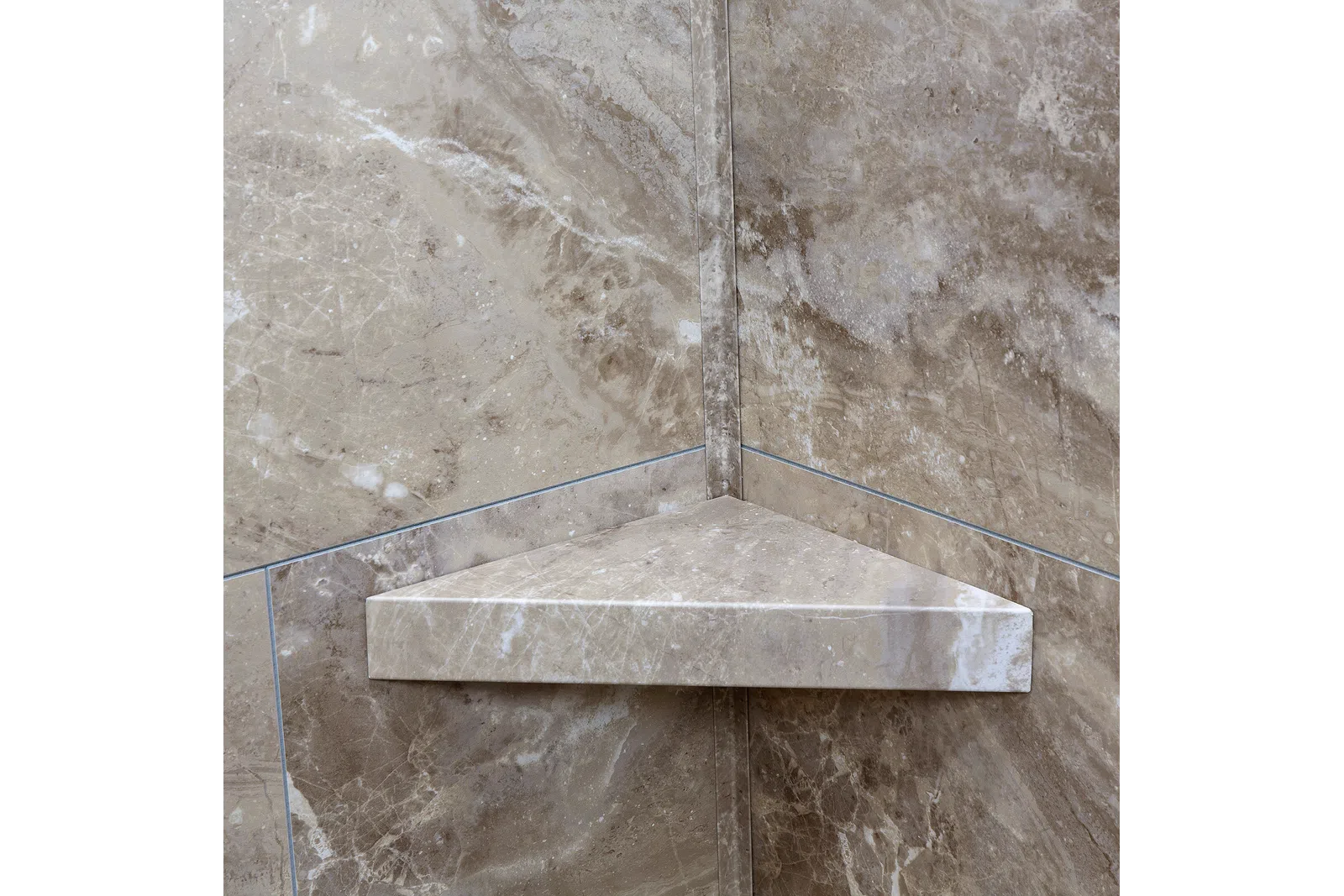 Corner marble shower shelf with beige and brown natural stone texture and polished finish.