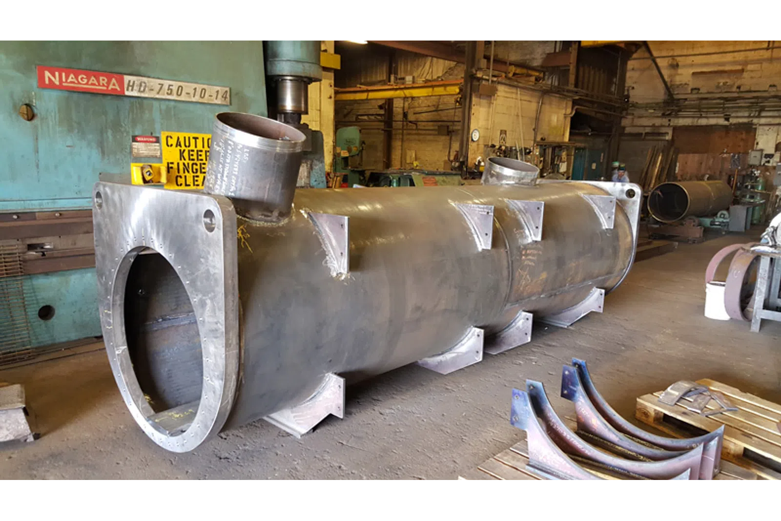 a large metal tank in a factory