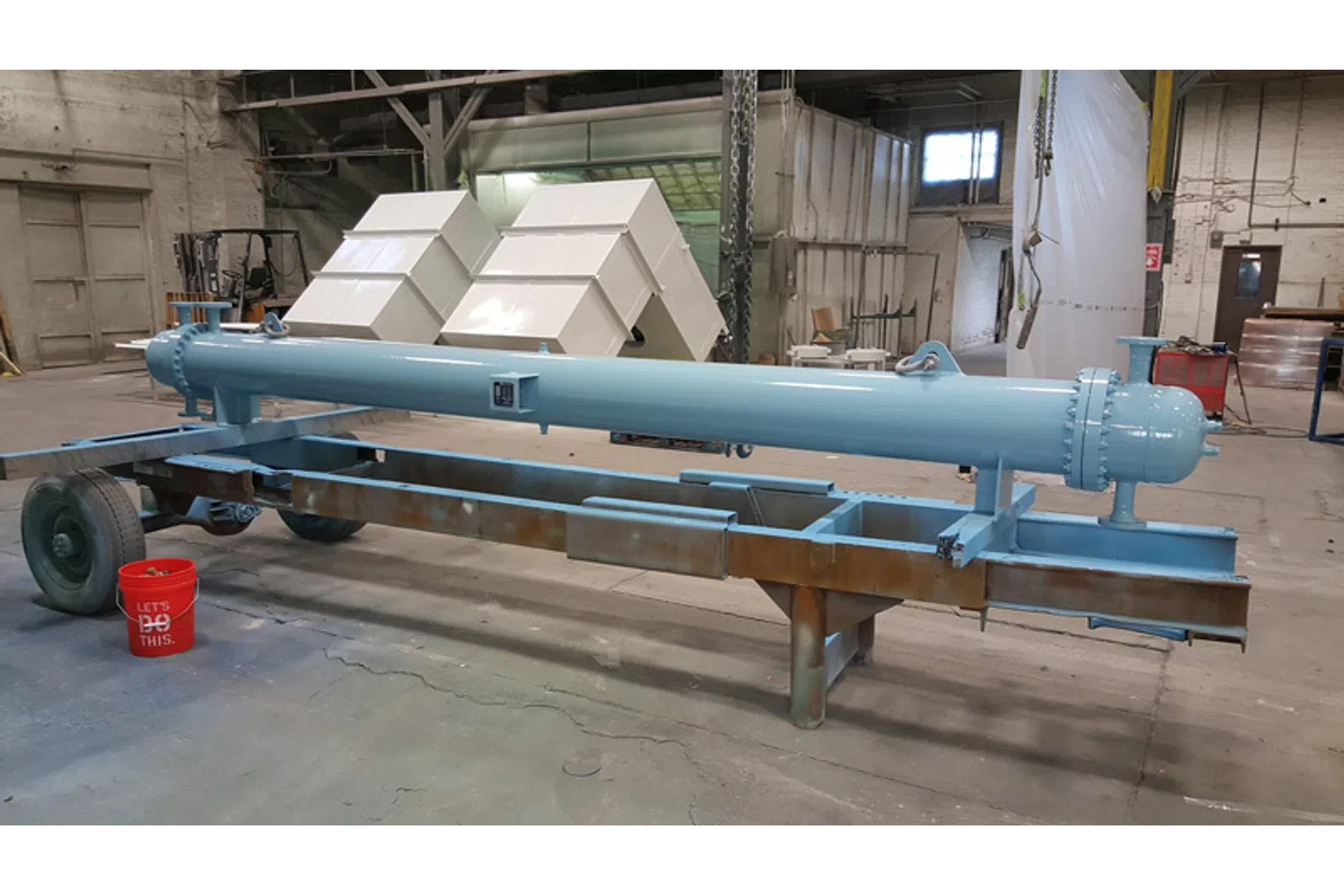 a large blue missile on a trailer