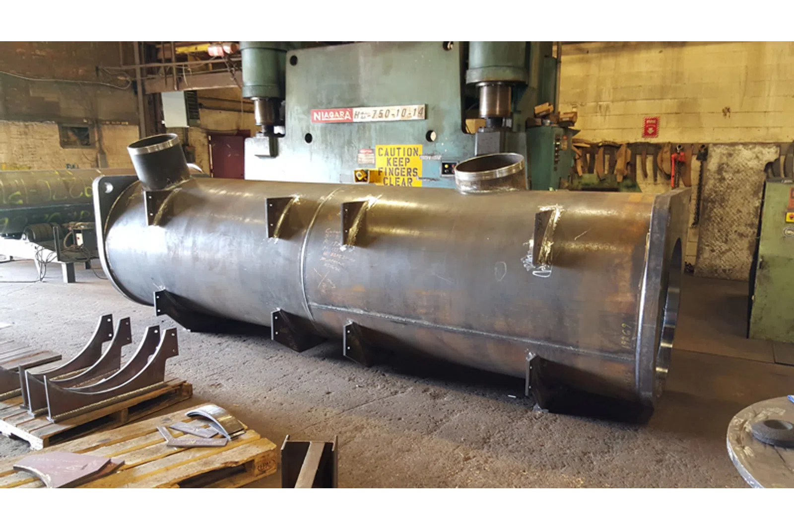 a large metal tank in a factory
