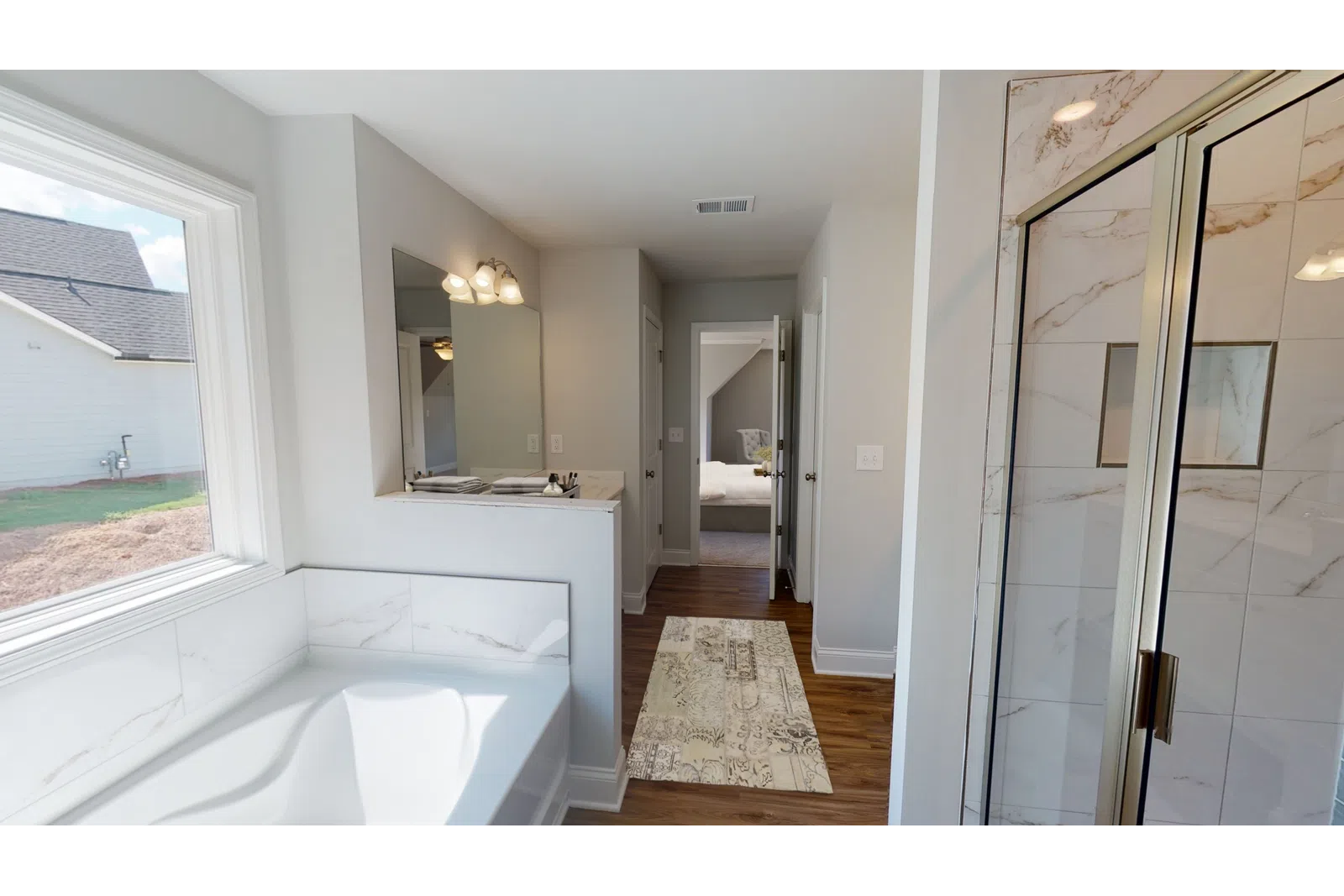 a room with a sink and a mirror