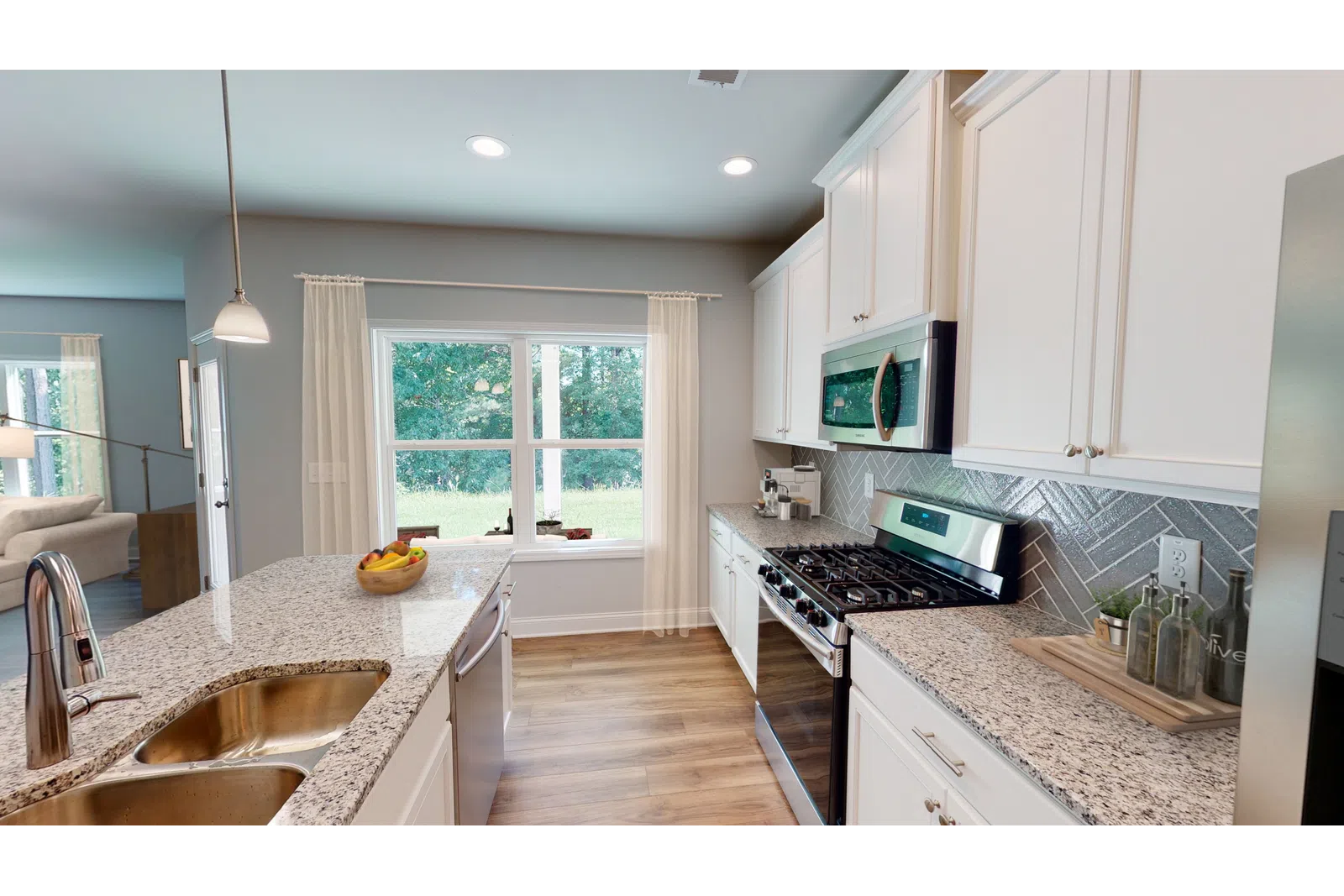 a kitchen with an island in the middle of a room