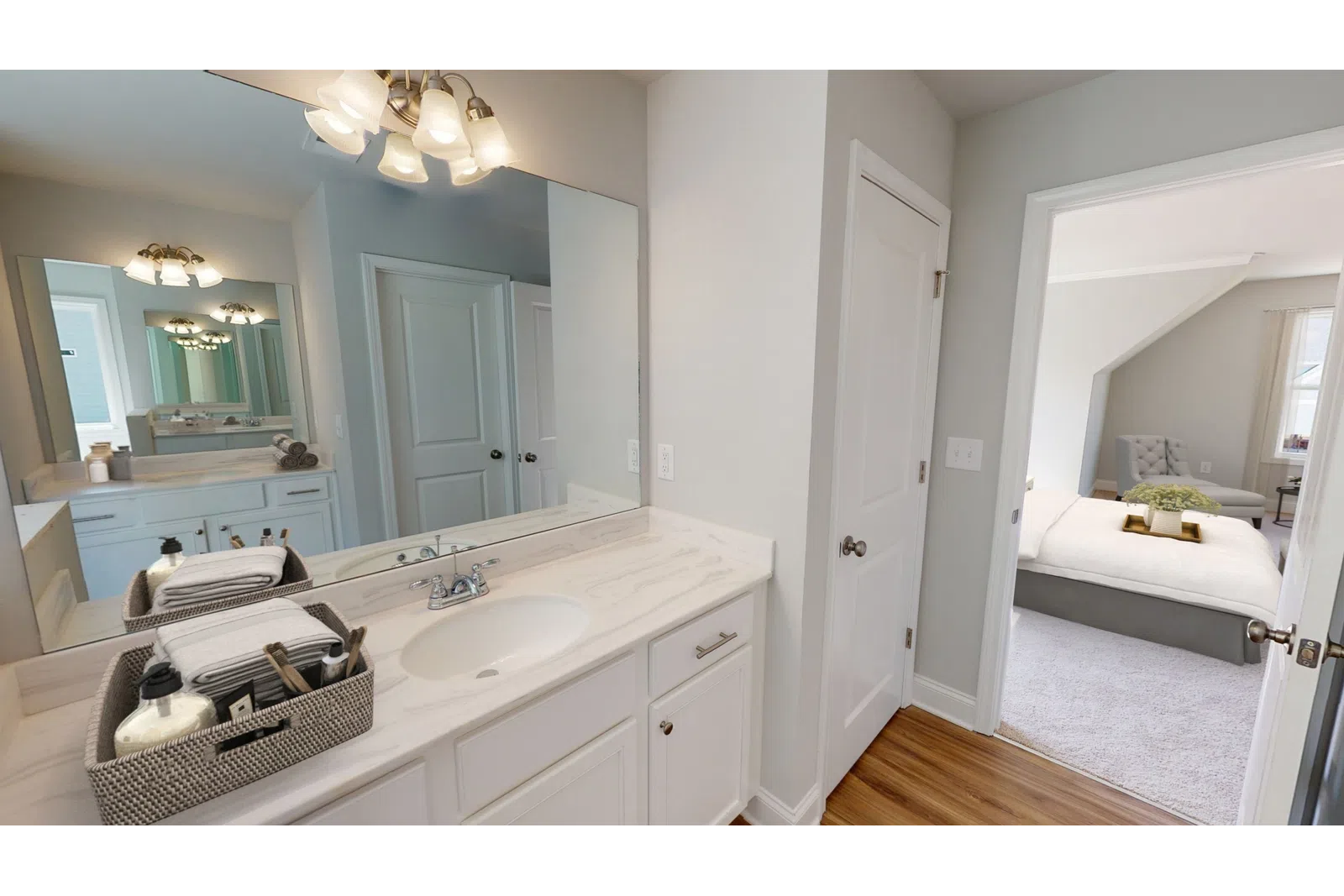 a room with a sink and a mirror