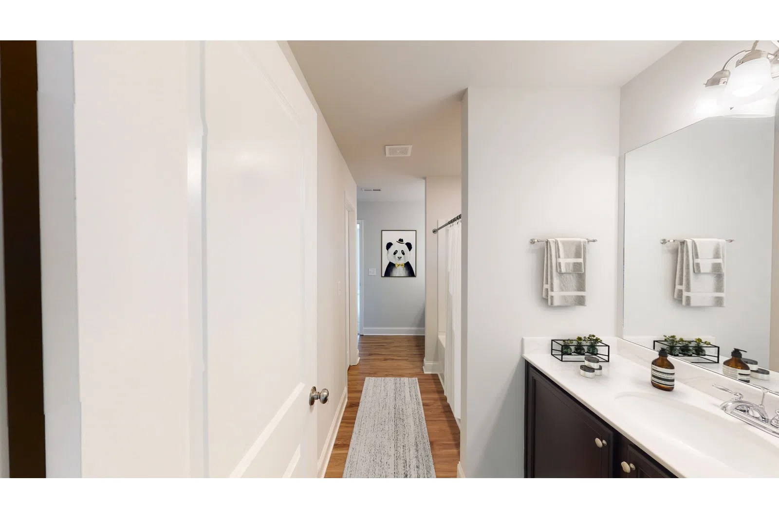 a kitchen with a sink and a refrigerator