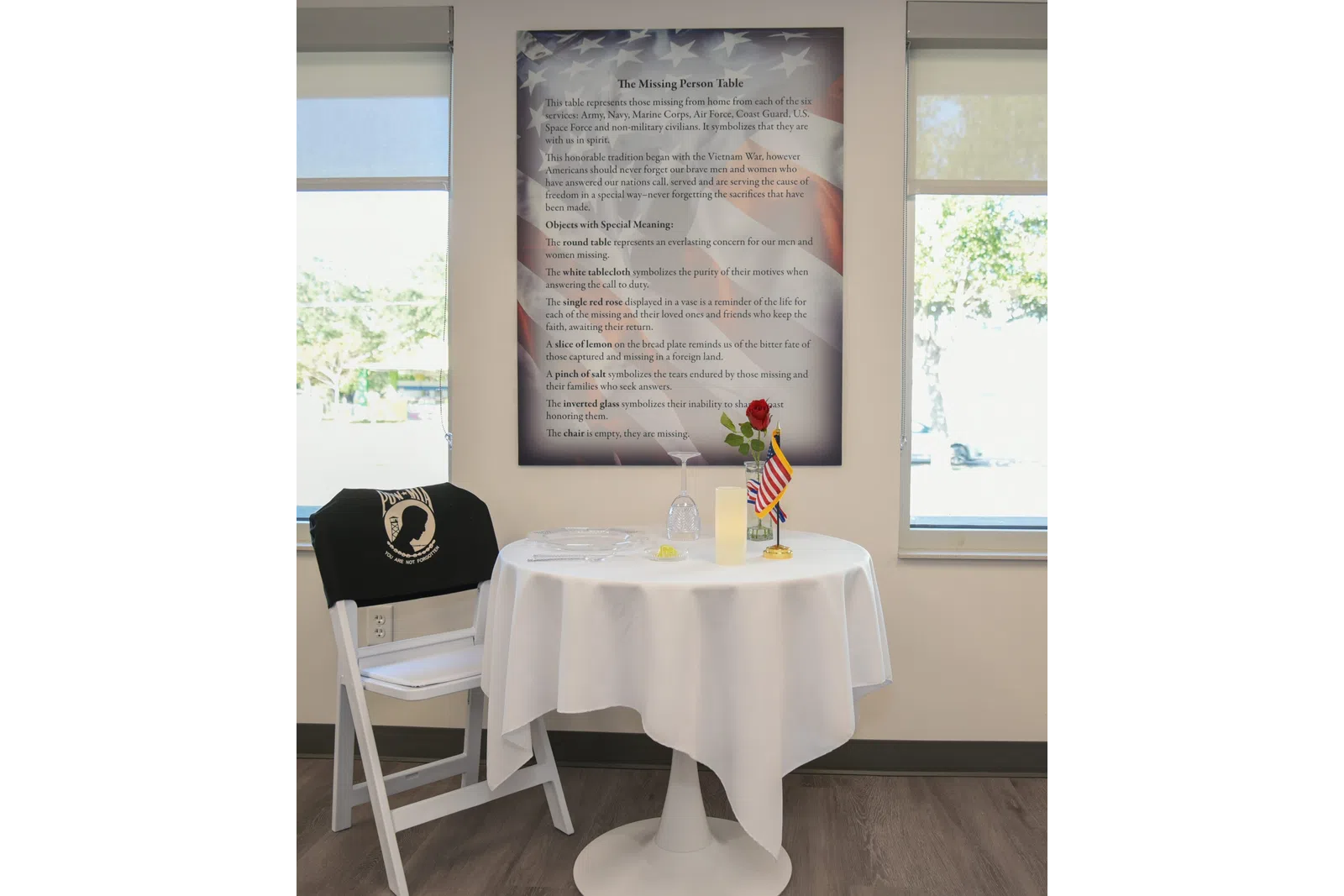a table with a flag and chairs