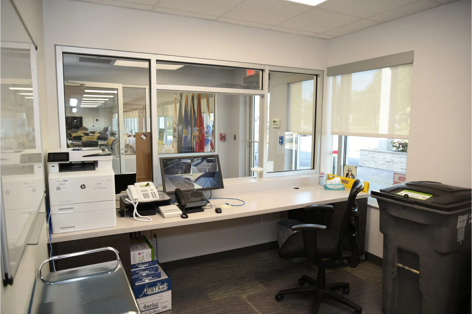 an office with a desk and computer