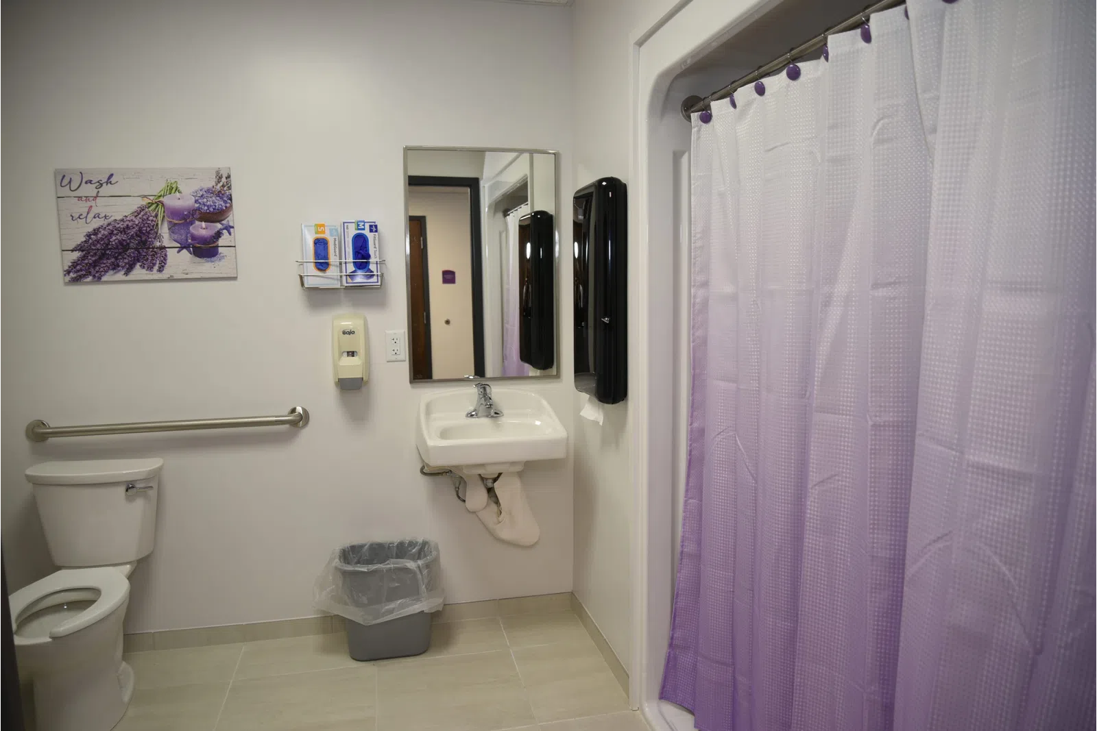 a bathroom with a shower curtain
