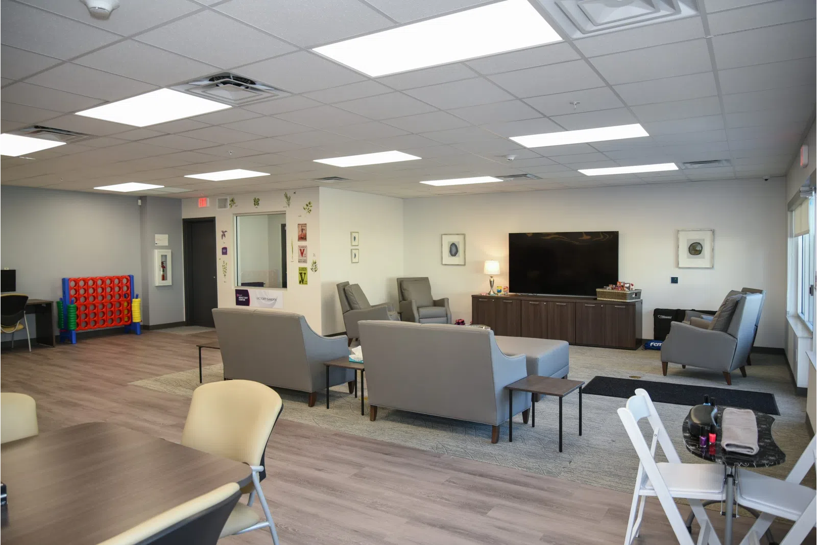 a room with chairs and tables