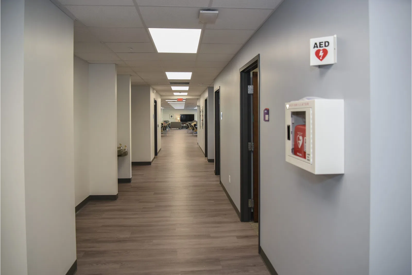 a long hallway with white walls