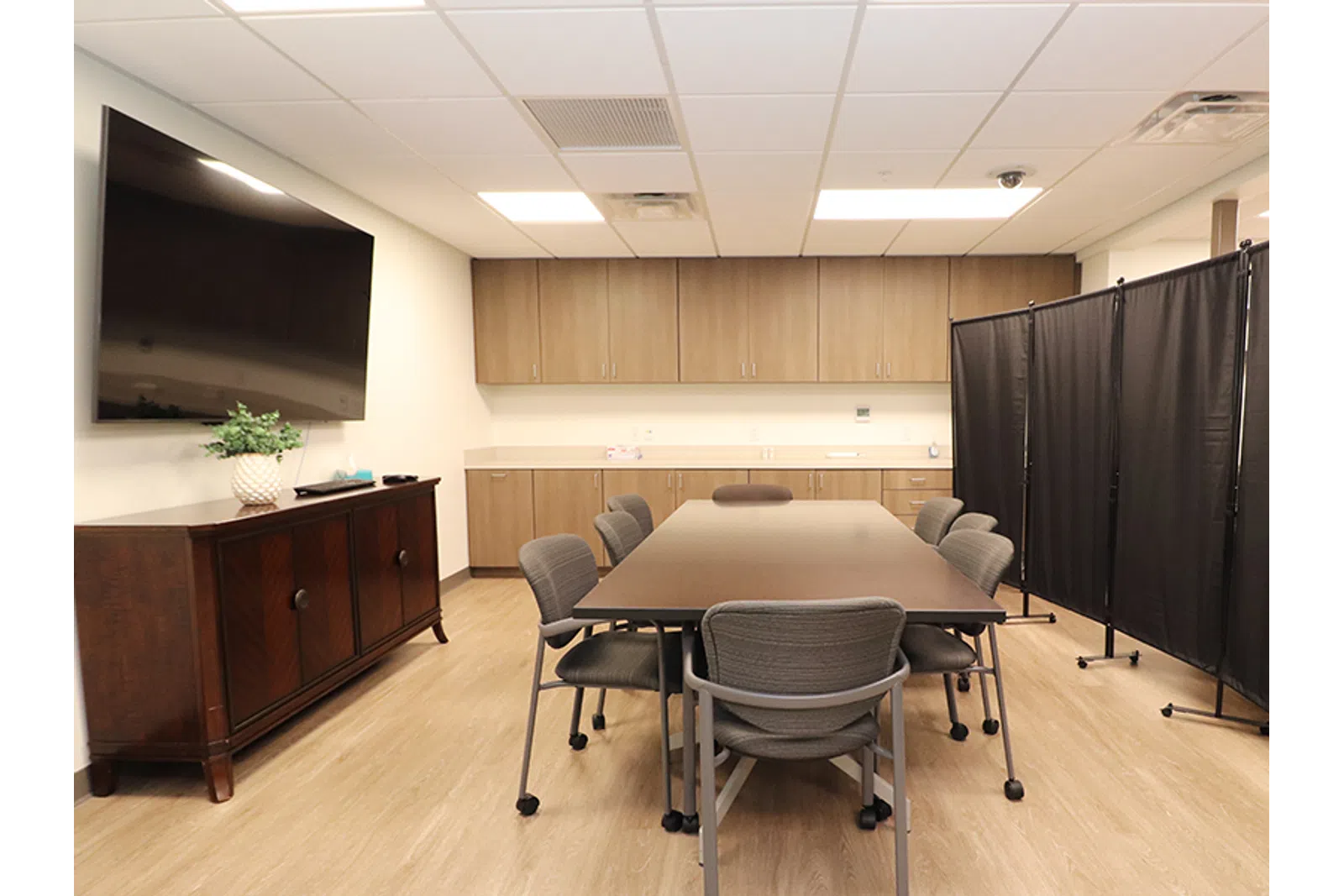 a room with a table and chairs