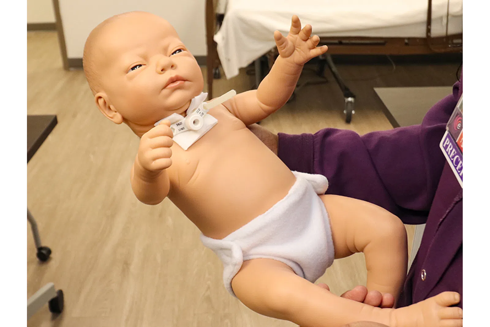 a baby holding a remote control