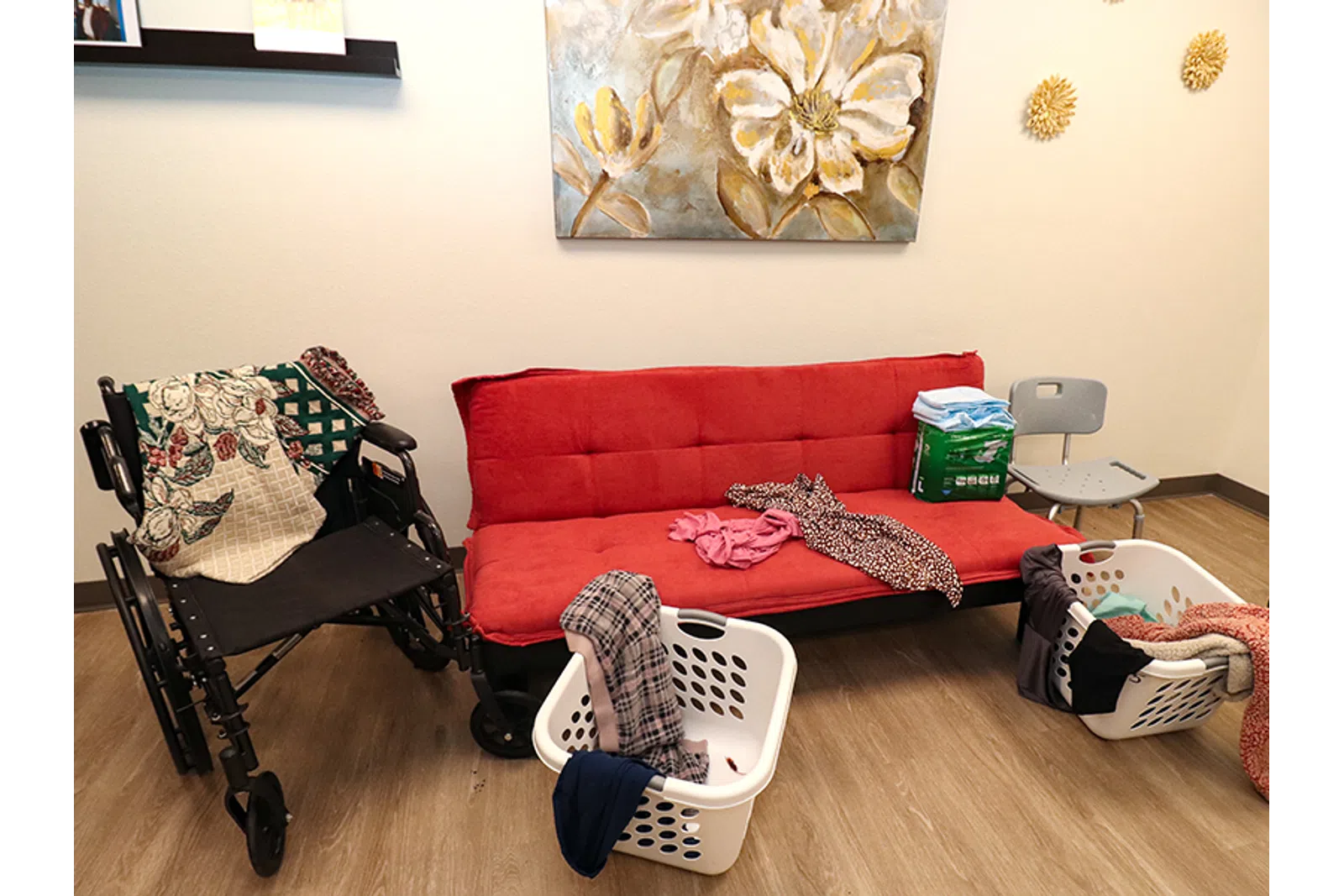 a living room with a red couch