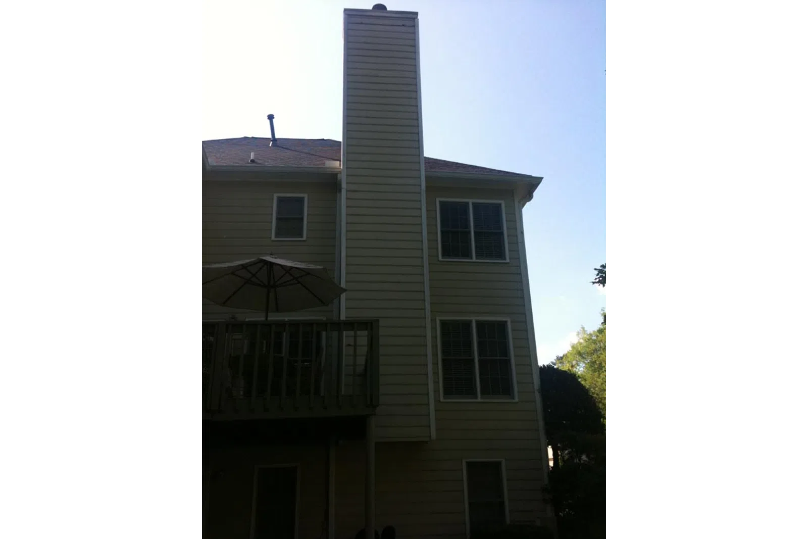 a house with a tall chimney
