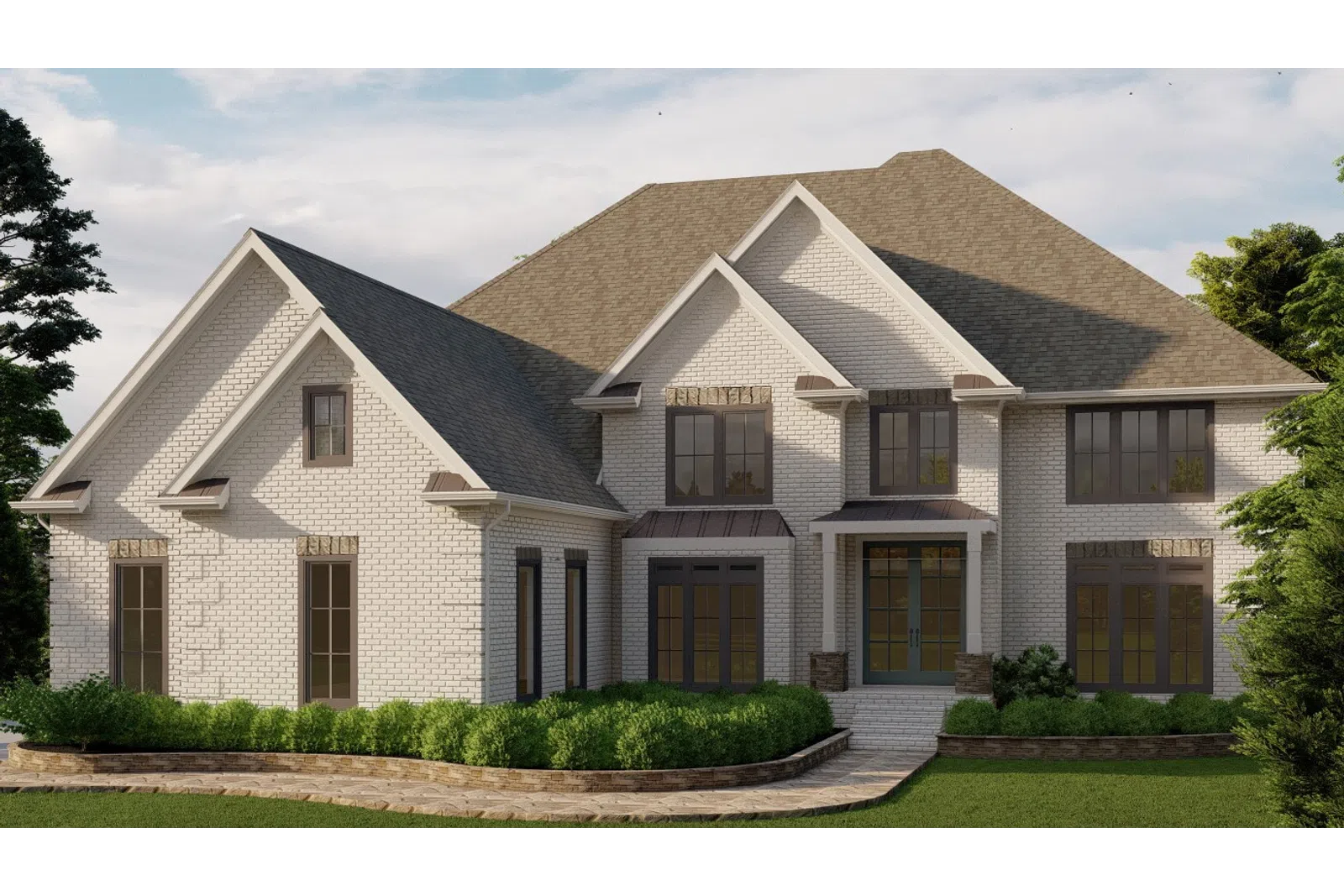 Large two-story white brick house with multiple gable roofs and large windows surrounded by greenery.
