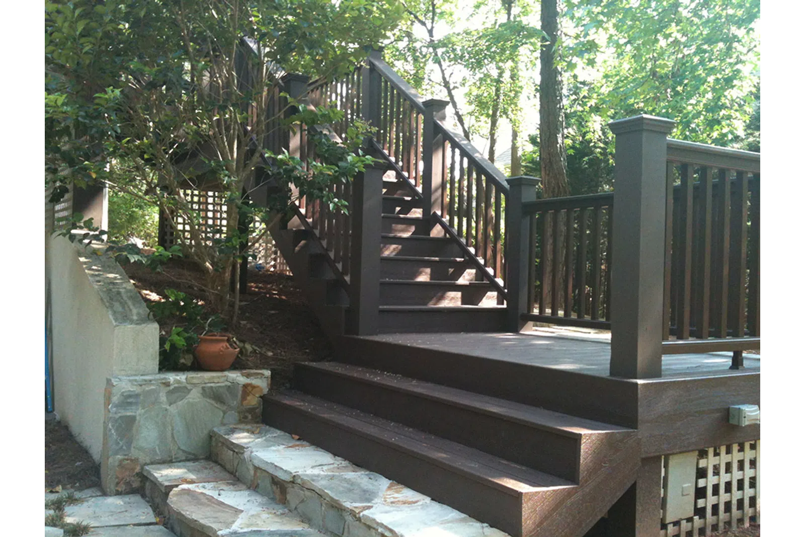 a set of stairs leading up to a fence