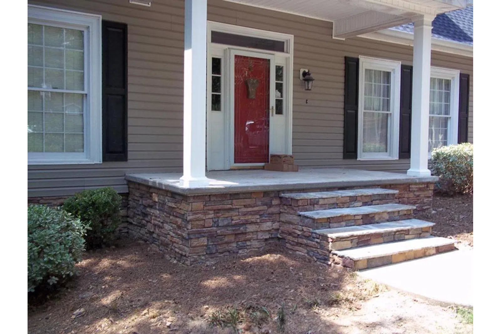a house with a brick patio