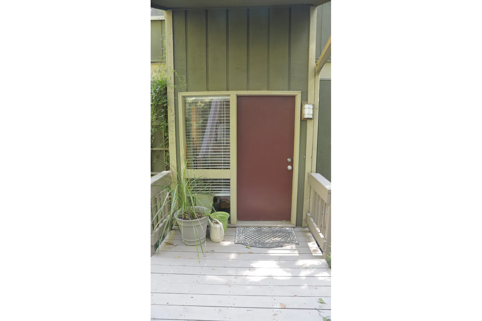 a window with a red door