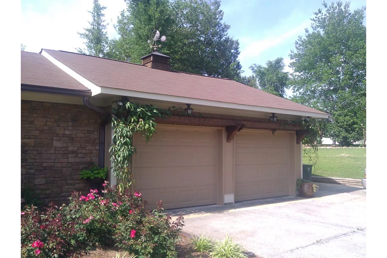 a garage with a brick wall