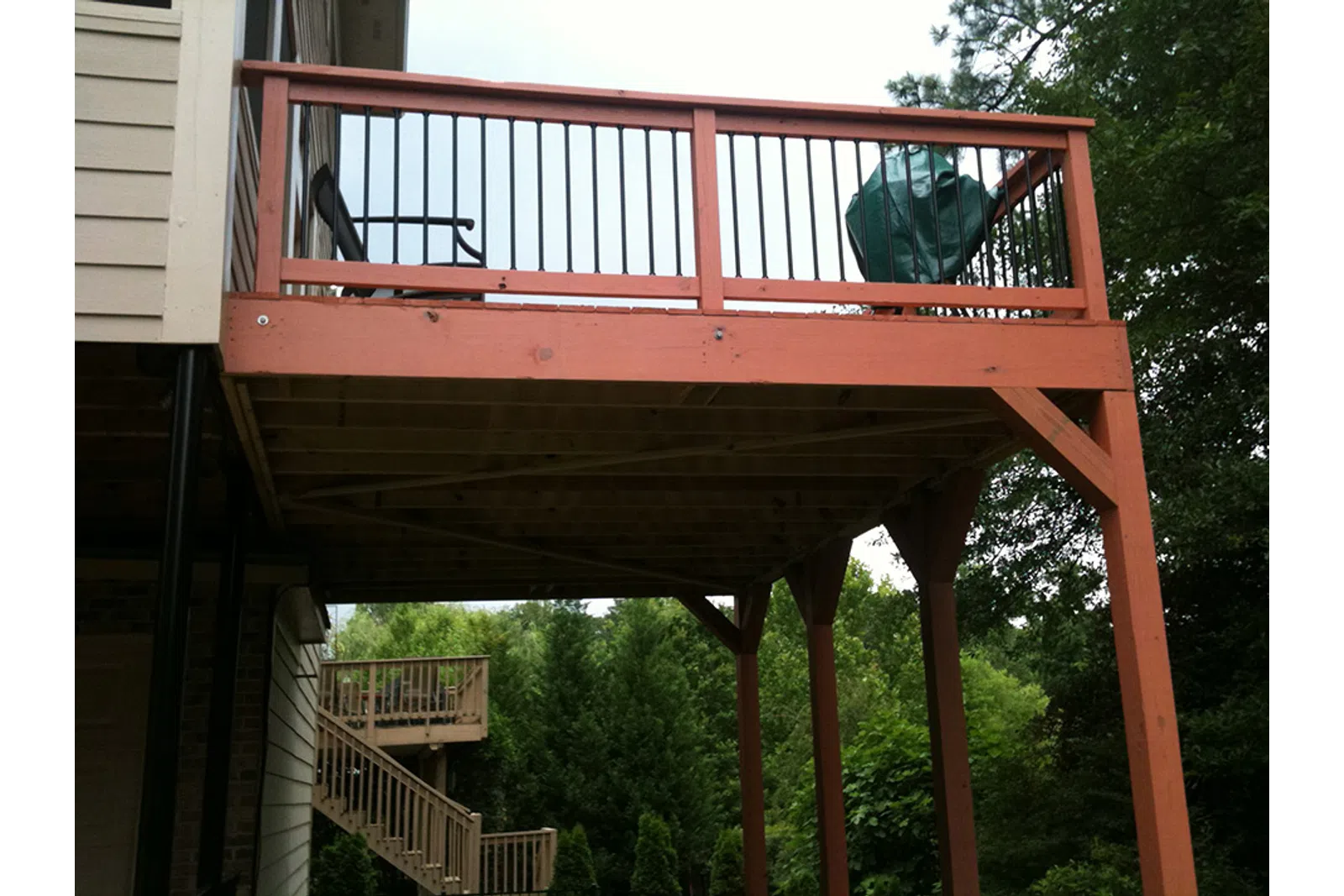 a wooden structure with a railing
