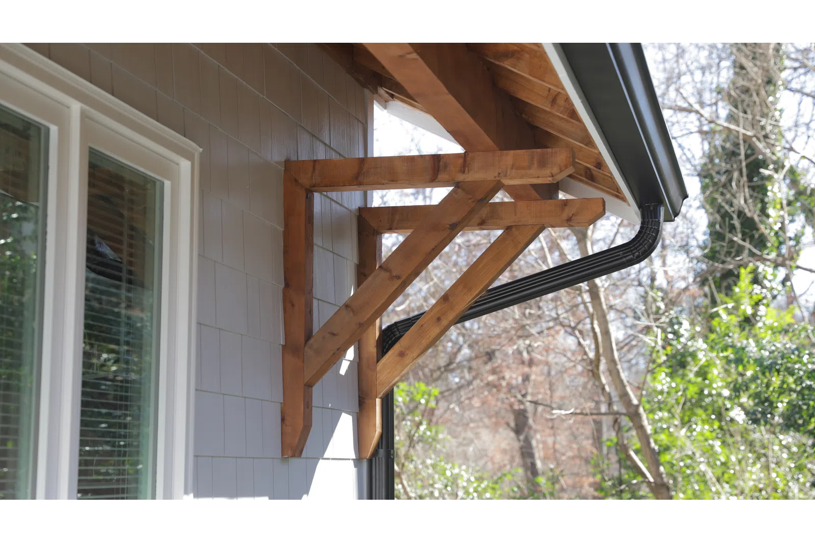 a wooden ladder leaning against a wall