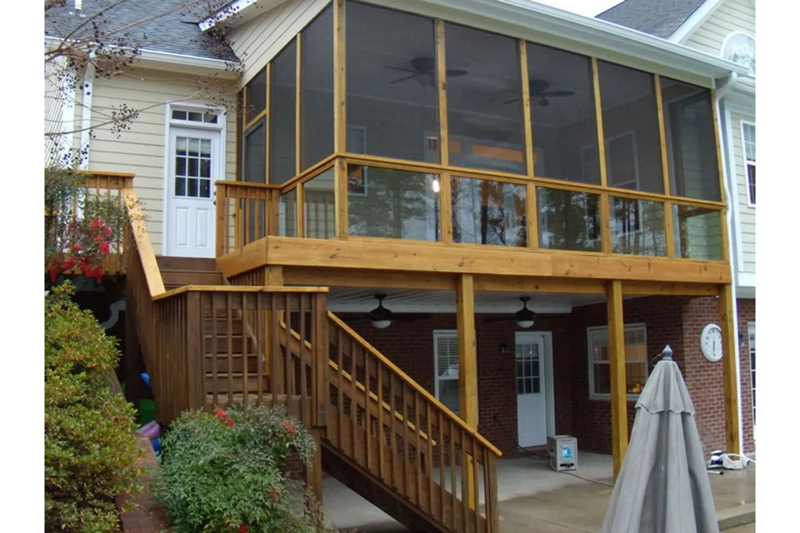 a wooden house with a deck