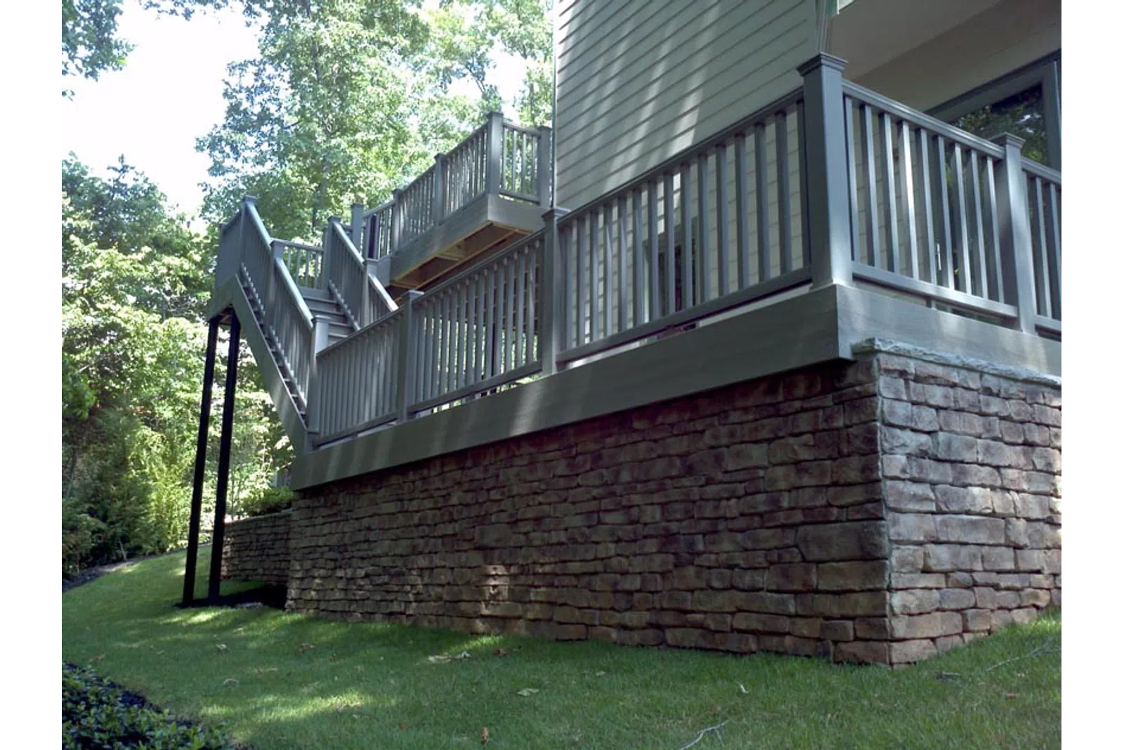 a brick wall with a brick railing