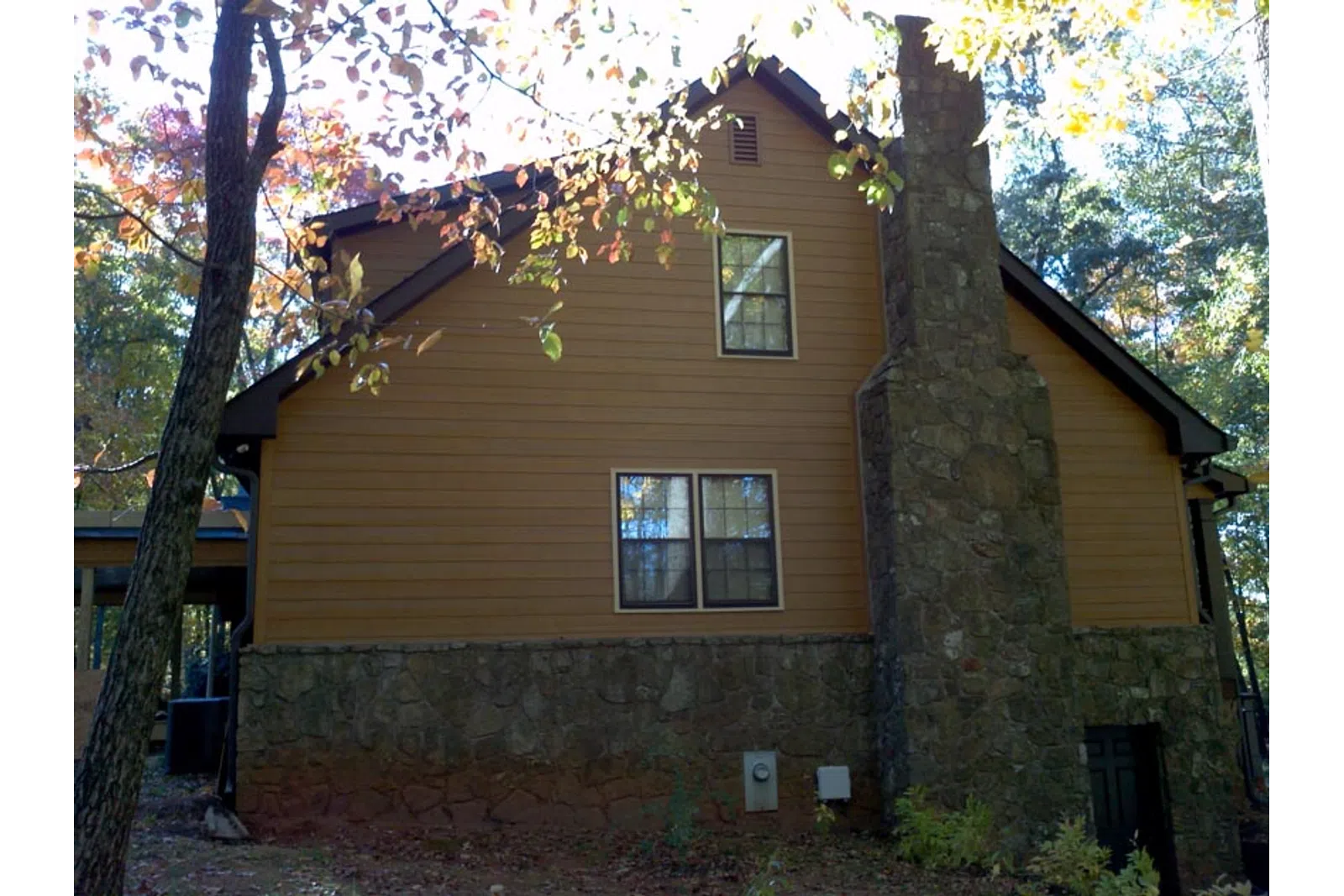 a house with a tree in the front
