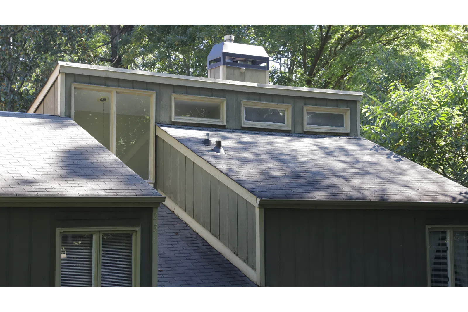 a small house with a solar panel