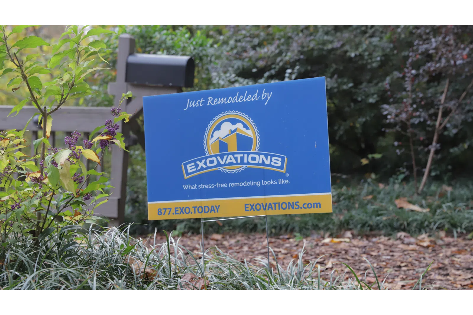 a sign in a garden