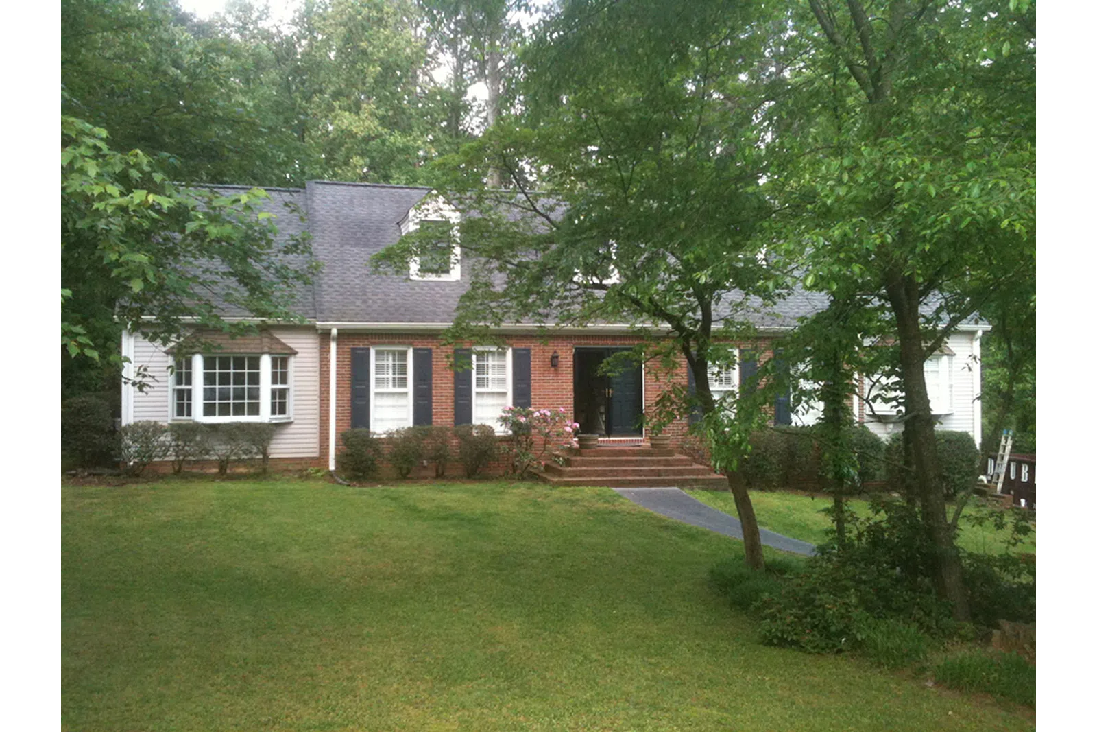 a house with trees around it