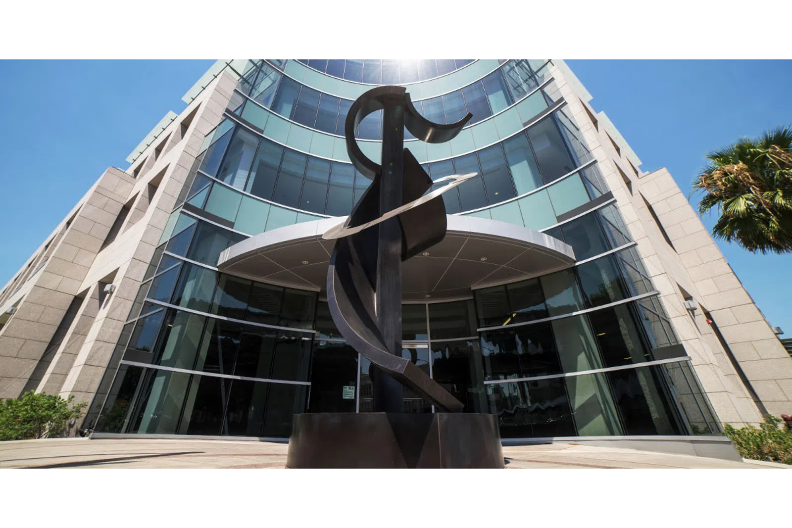 a statue in front of a building