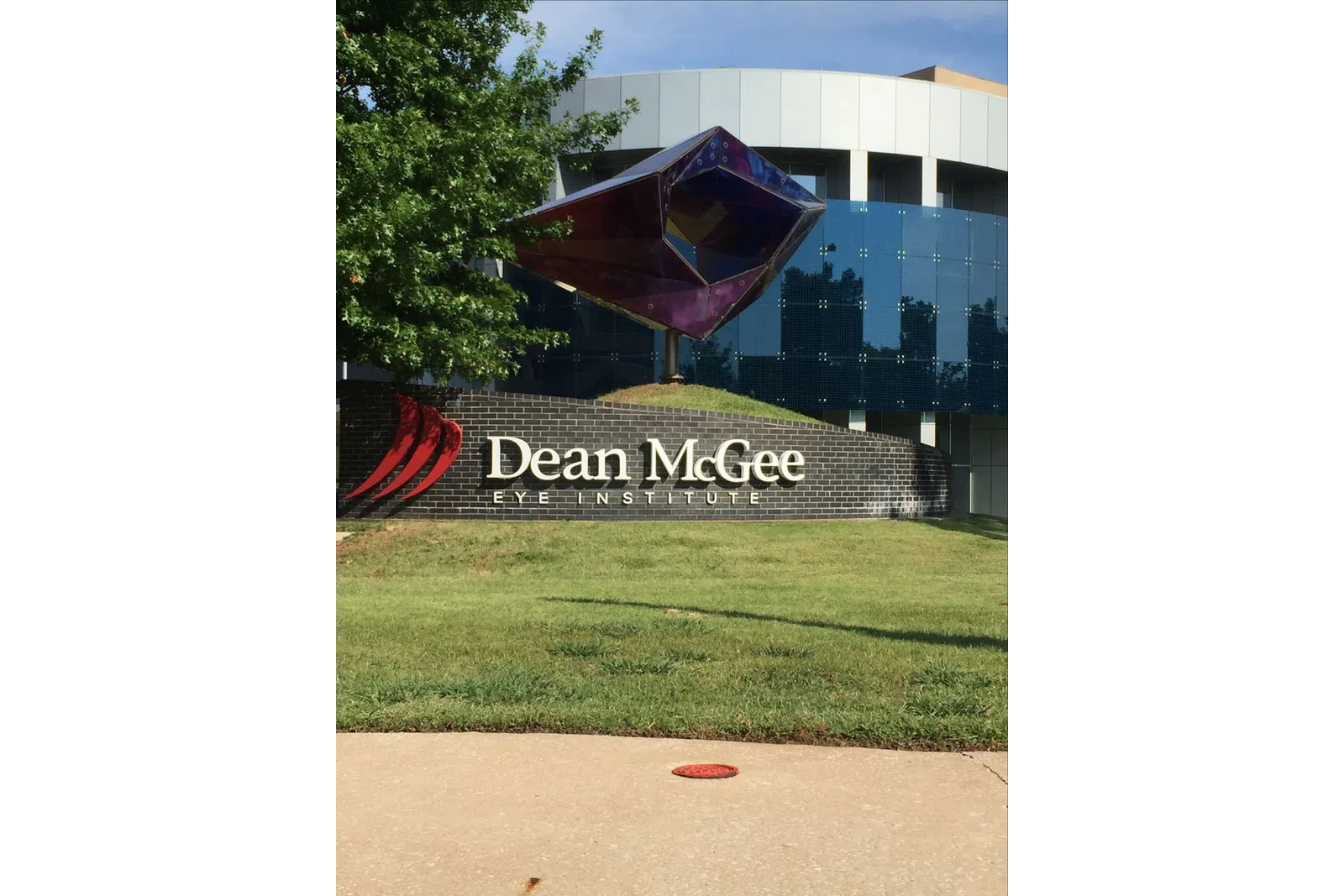 a sign in front of a building