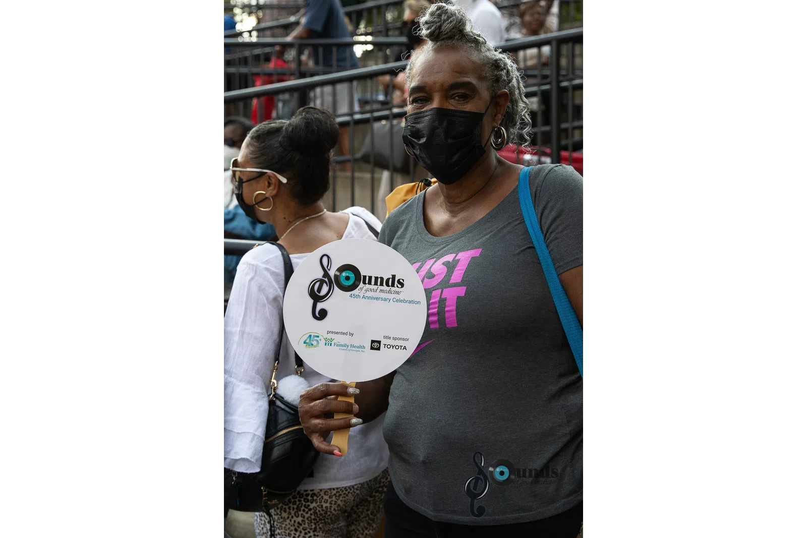 a person standing in front of a crowd