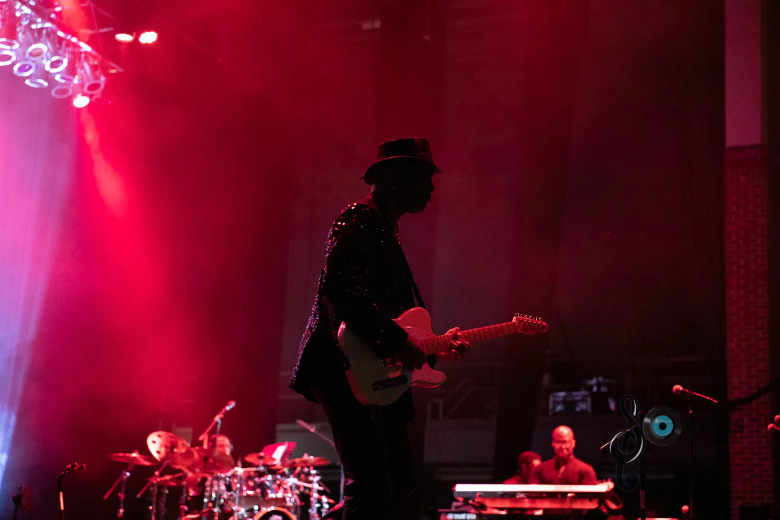 a man standing in front of a stage