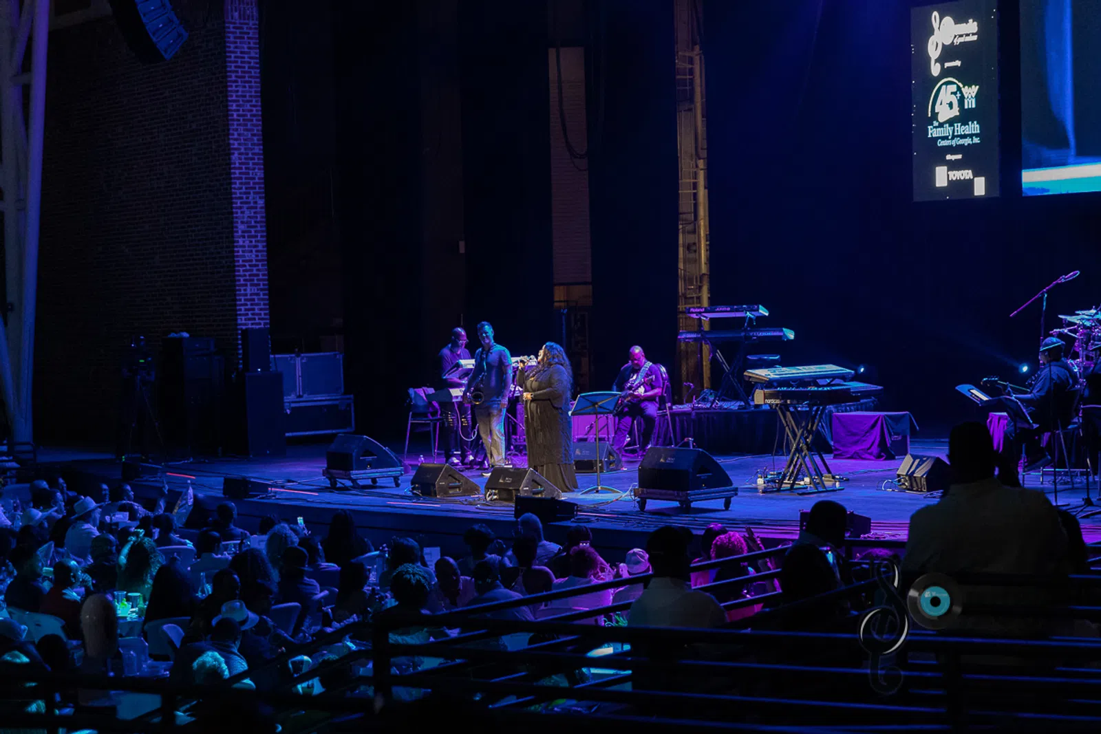 a group of people on a stage