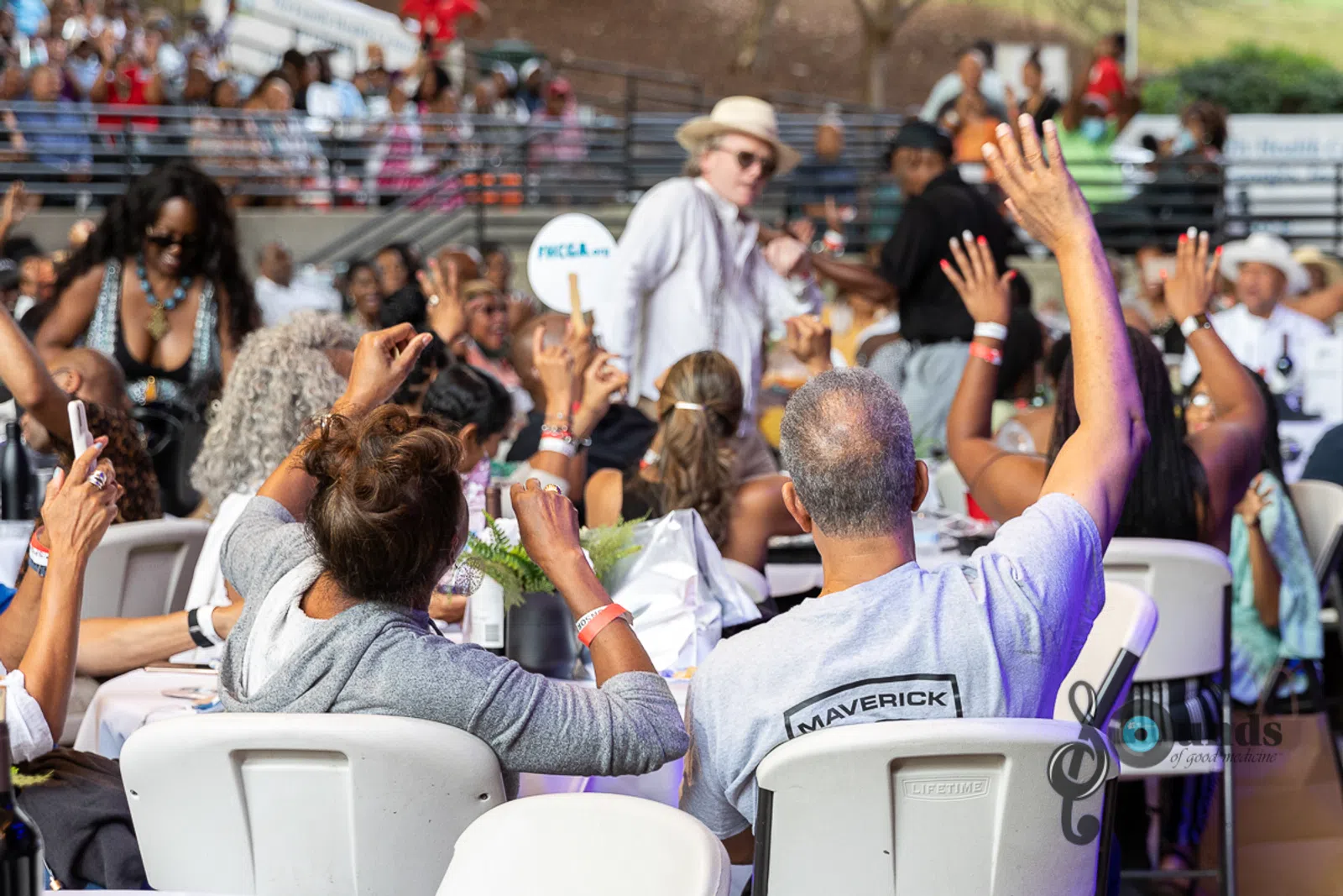 a group of people in front of a crowd