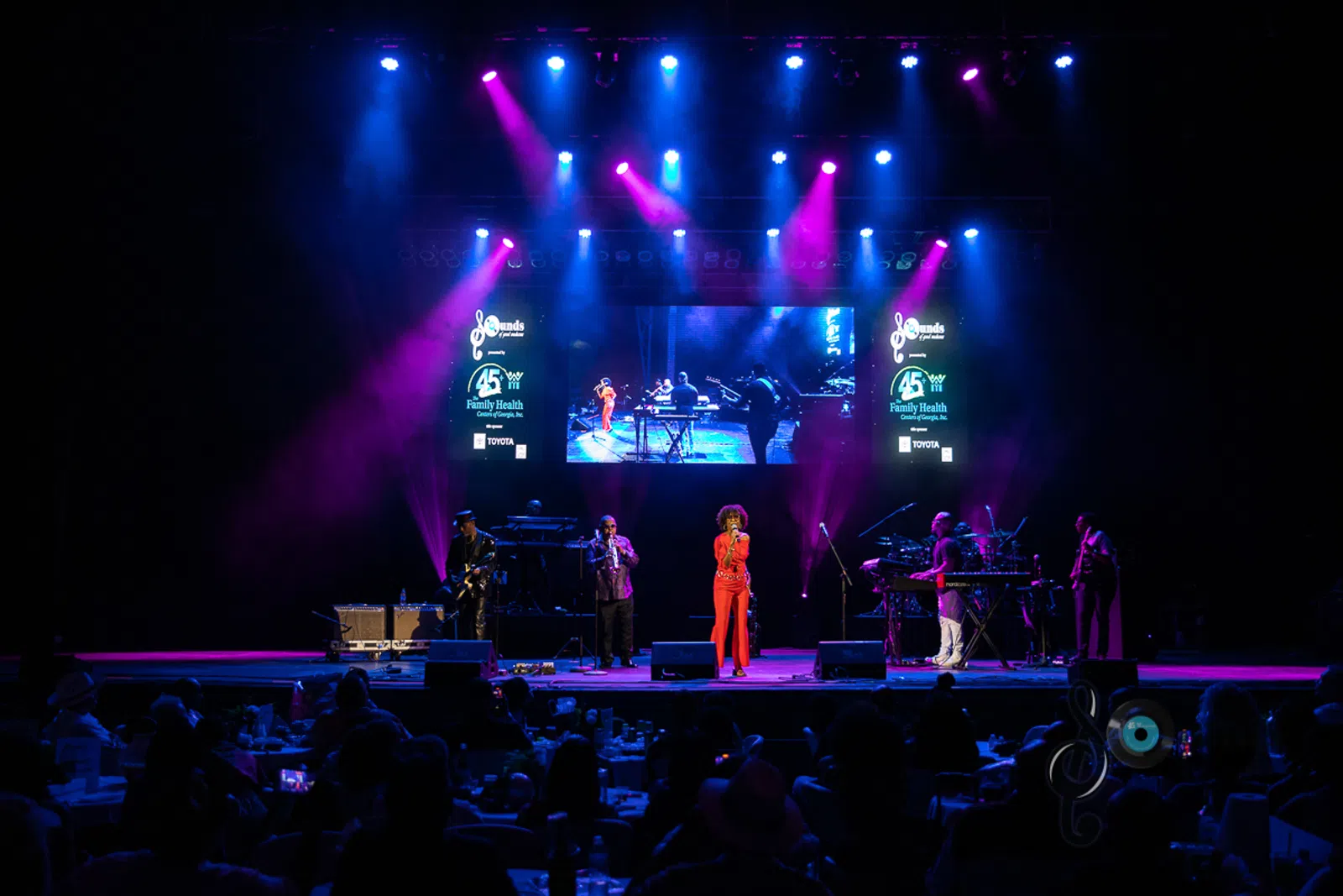 a group of people on a stage
