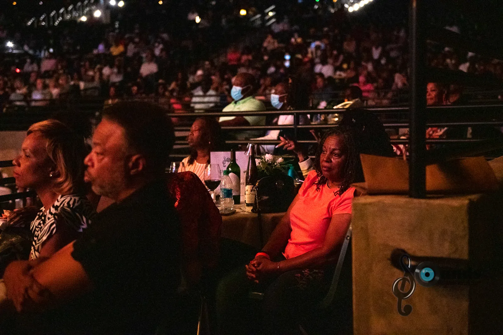 a group of people in a dark room