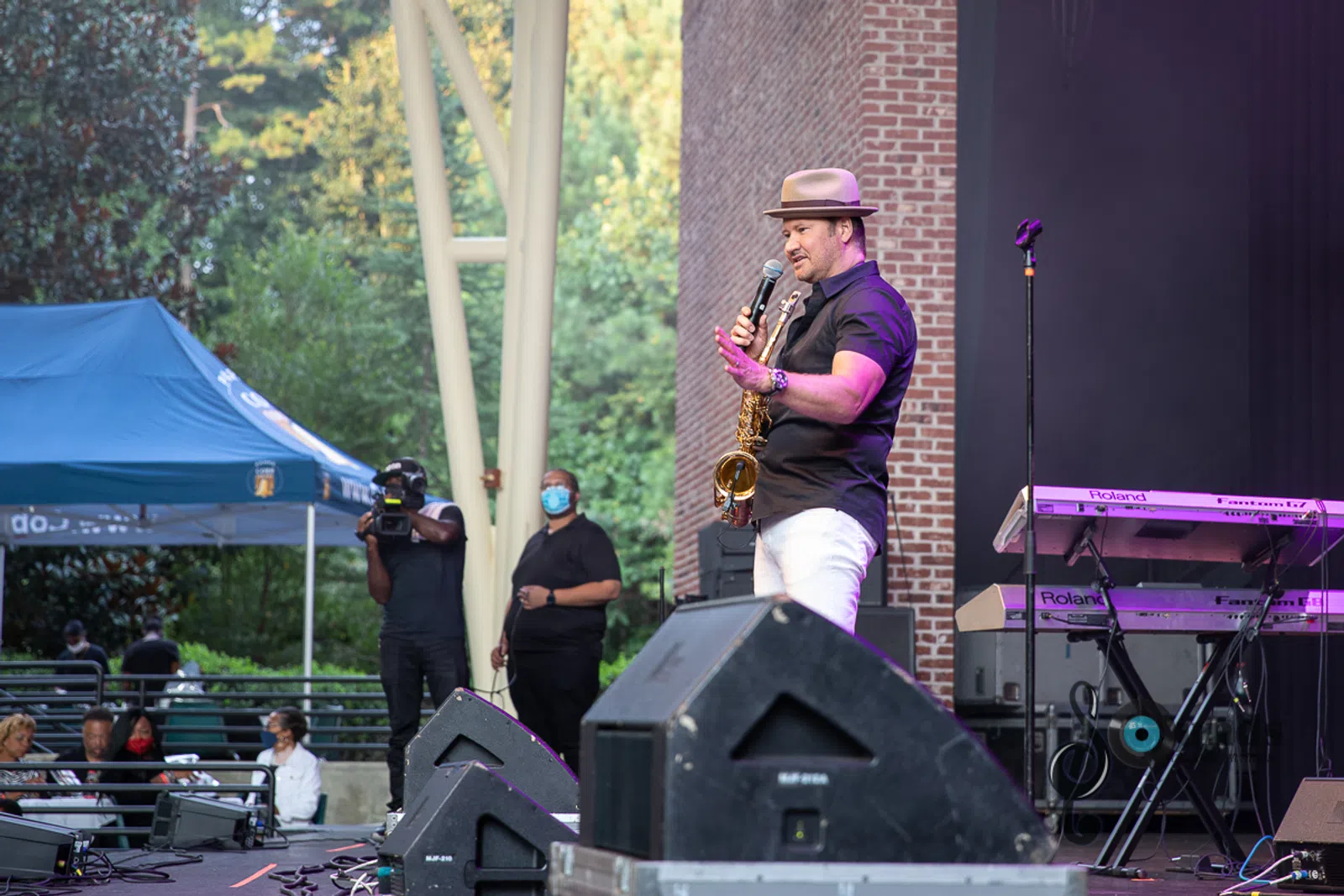 a person standing in front of a stage
