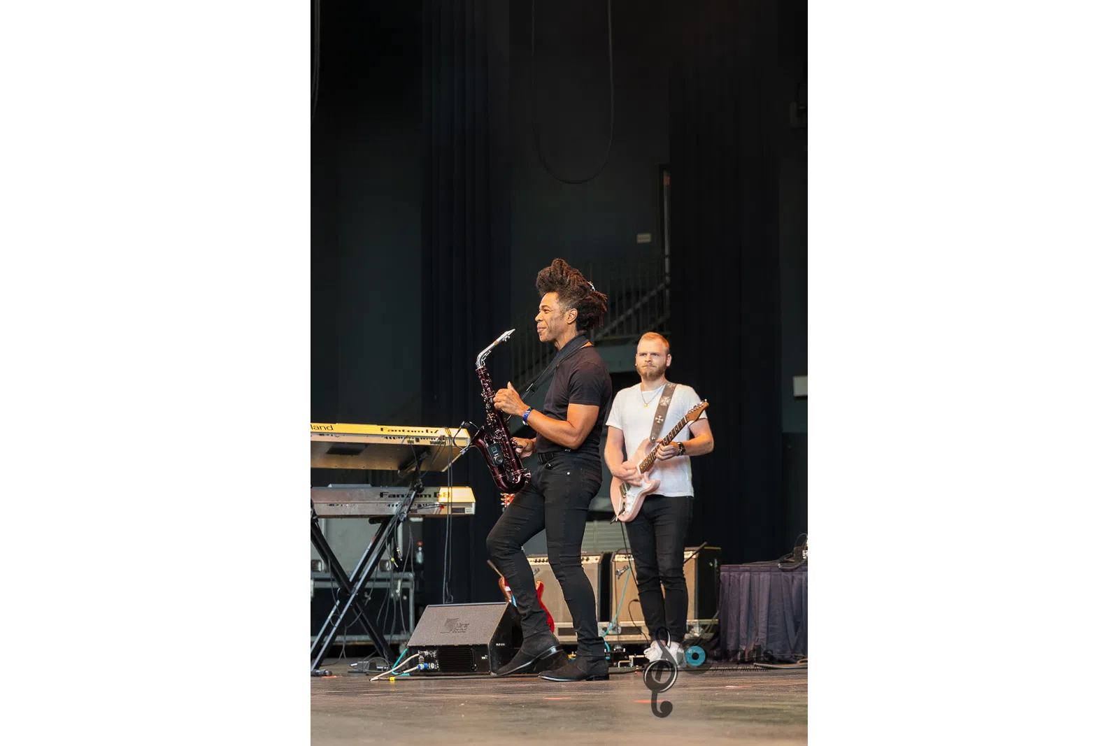 Paul Taylor standing on a stage