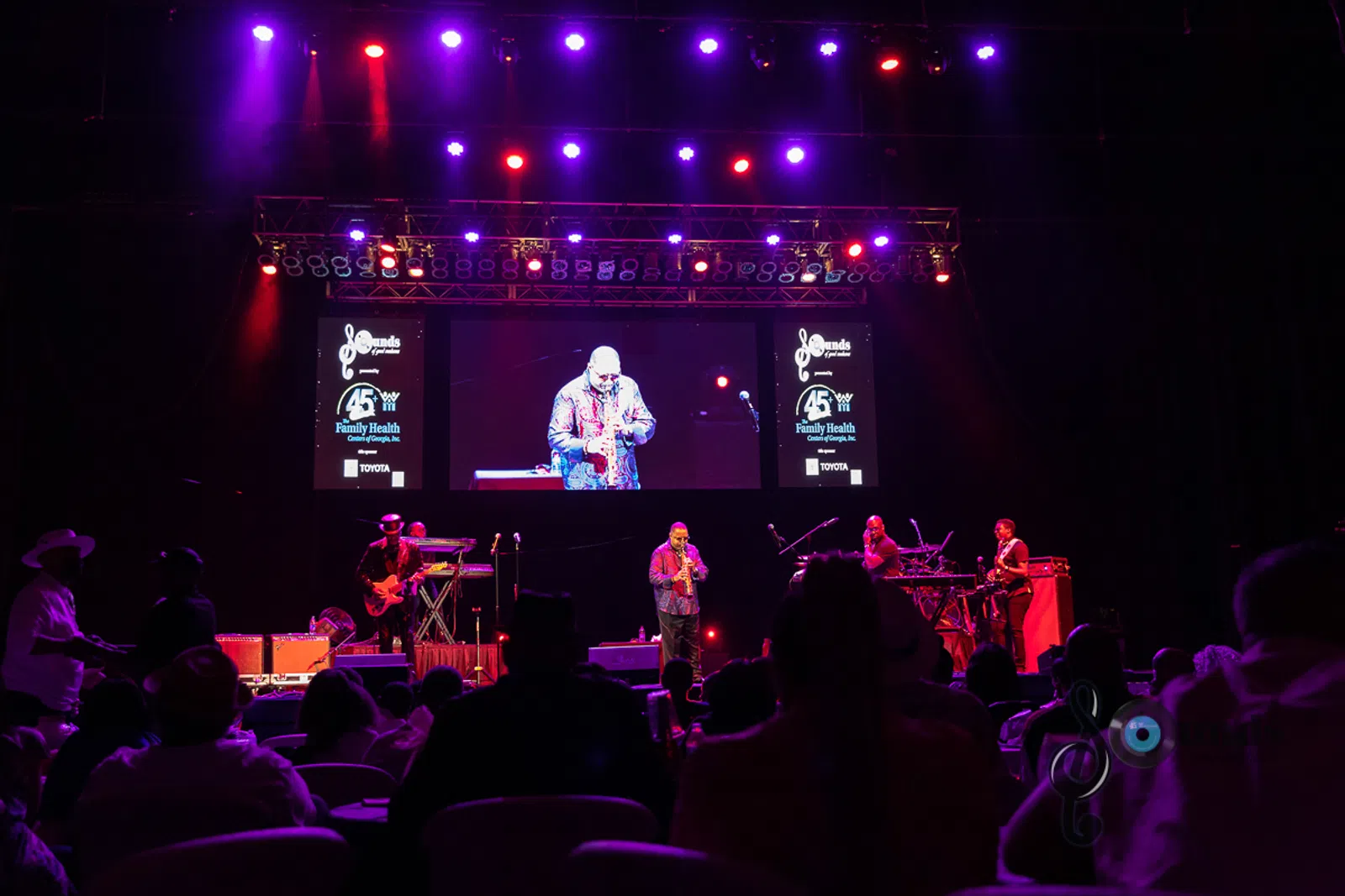 a group of people on a stage