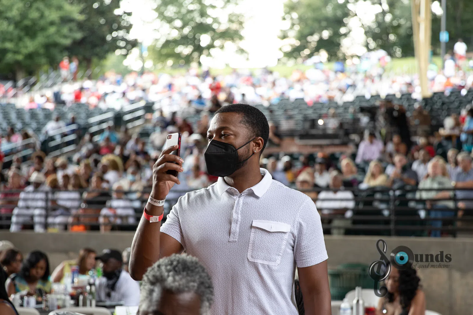 a man standing in front of a crowd