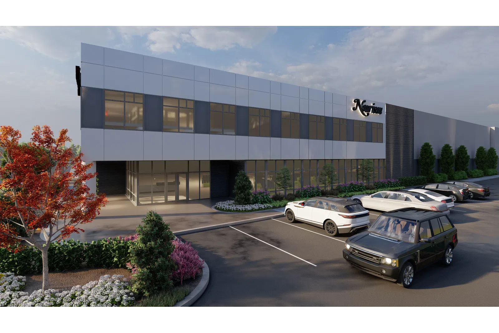 a parking lot with cars and a building in the background